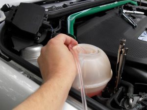 Siphon the tank