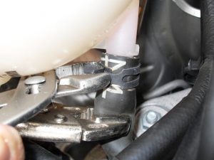 Unclamp the tank