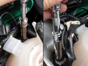Remove two front bolts for cage above turret