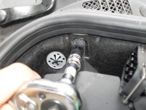 Remove the rear bolt from the frame