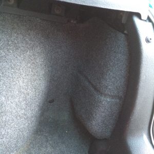Boot carpet covering righthand light cluster